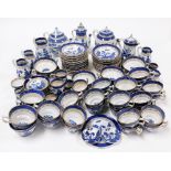 A Booths Real Old Willow pattern part service, comprising coffee pots, teapots, graduated milk jugs,