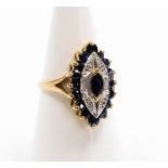 A 9ct gold dress ring, with shaped marquise ring head, with central sapphire surrounded by tiny cz s