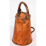 A copper hot water jug, with loop handle and spout top, unmarked, 25cm high.