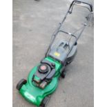 A Tecumsen Performance Power petrol lawnmower, model 35, in green.