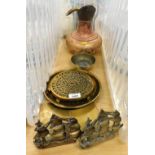 A quantity of copper and brass wares, to include brass trivet, serving trays, bookends, etc. (a quan