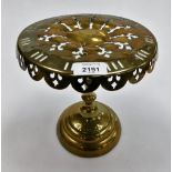 A late 19thC brass kettle stand, with pierced decoration, numbered 18667.