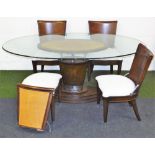 A large oval glass table, with tapered stem centre with rush cane detailing and four associated chai