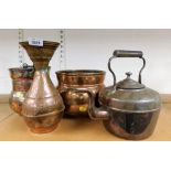 A group of copper wares, to include two copper pots, a teapot and an Eastern style vase. (4)