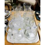 A group of glassware jugs, some of etched design, and two plain design. (8)