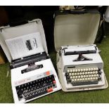 Two cased portable typewriters, to include an Adler and a Super Deluxe Rover 5000. (2)