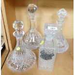 Four cut and press glass decanters, and a whiskey label. (4)