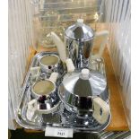 An Everhot stainless steel and ceramic Picquot ware type tea and coffee service, comprising teapot,