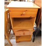 Two pine bedside cabinets.
