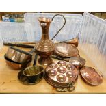 A group of assorted pans and brass ware, copper warming pans, coaching horns, modern Eastern brass s
