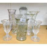 A group of glass vases.