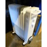 A white portable electric radiator.