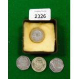 A group of collectors coins, a 1986 thistle two pound coin, a 50th Anniversary 50 pence piece, dated