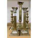 Five various brass candlesticks, an alter stick. etc. (5)