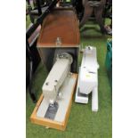 Two sewing machines, to include a Elna 1010 sewing machine and a Singer model 239 cased sewing machi
