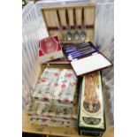 Three cased sets of silver plated cutlery, boxed glassware and a Moet and Chandon champagne tin box,