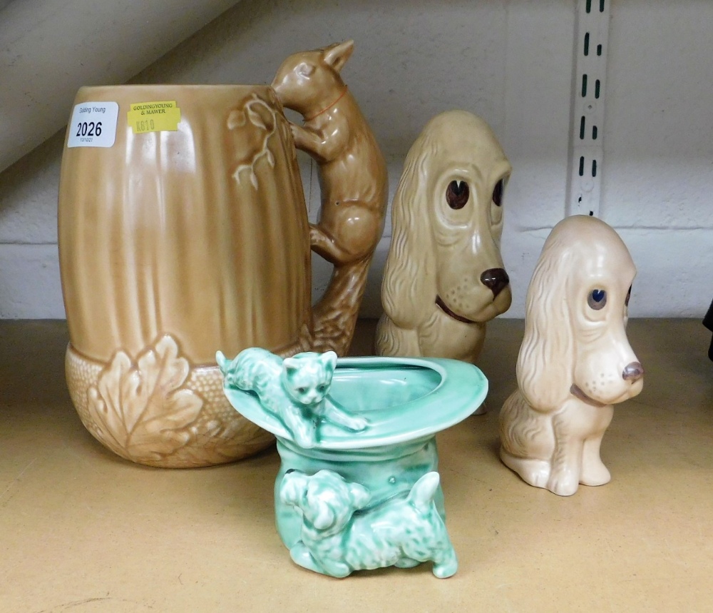 A group of Sylvac, to include a Sylvac squirrel jug, two dogs and a green cat hat ornament.