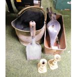 A brass coal bucket, a copper planter, bellows and pair of candlesticks.