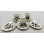 Three Royal Worcester coffee cans and five saucers, each decorated with a blackbird, with black stam