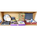 Cassettes, wall clocks, an IQ video studio processor, scart lead box, etc. (1 shelf)