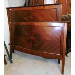 An Edwardian marquetry and walnut inlaid double bed frame, the bed end with curved front with metal