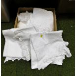 A group of linen, knitted tablecloths, etc. (1 box)