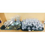 A group of crystal glassware, each with crown emblem, comprising wine glasses, sherry glasses, shot