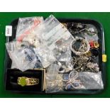 A group of costume jewellery, wristwatches, bagels, beaded necklaces, clip on earrings, dress rings,