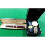 An Oris gold plated wristwatch, on expanding strap, with two fountain pens, one Schaeffer. (3)