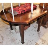 An oak dining table and a geometric pattern rug. (2)