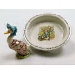 A Beatrix Potter Jemima Puddle Duck figure, and a Wedgwood Peter Rabbit dish.