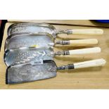 Four Victorian bone handled and silver plated crumb scoops, each with an engraved scoop body.
