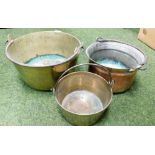 Three assorted brass and copper pans.