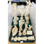 A group of white and cream finished resin figures, to include warriors on horseback, figures of ladi