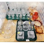 A group of decorative glassware, drinking glasses, dressing table set, storage jars, carnival glass