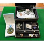 A faux leather jewellery box and contents, to include badges stick pins, etc. (a quantity)