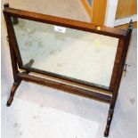 A walnut framed dressing table mirror.