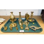 A group of brasswares, to include a group of brass candlesticks, swan ornaments, cobra inkwell, etc.