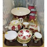 Various ceramics and effects, a red and gilt painted part tea service, set of three graduated pewter