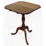 A George III oak occasional table, with canted top, baluster pillar and tripod base, 73cm high, the