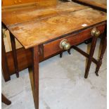 A 19thC oak side table, with two plank top and single drawer with brass handles on taper legs. (AF)