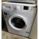 A Beko 8kg washing machine.
