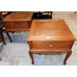 A pair of Chinese hardwood side tables, each with square top above single drawer with leaf scroll ha