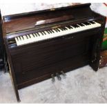 A Pollard and Pollard mahogany cased pianino.