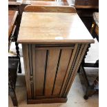 An early 20thC walnut pot cupboard.