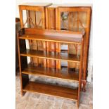 A 1950's/60's walnut display cabinet and a four tier bookshelf. (2)