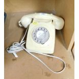 A vintage white plastic cased telephone, with Lincoln dial.