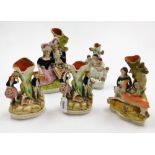 A group of five 19thC Staffordshire flat back figures, the largest 21cm high, and a smaller example,