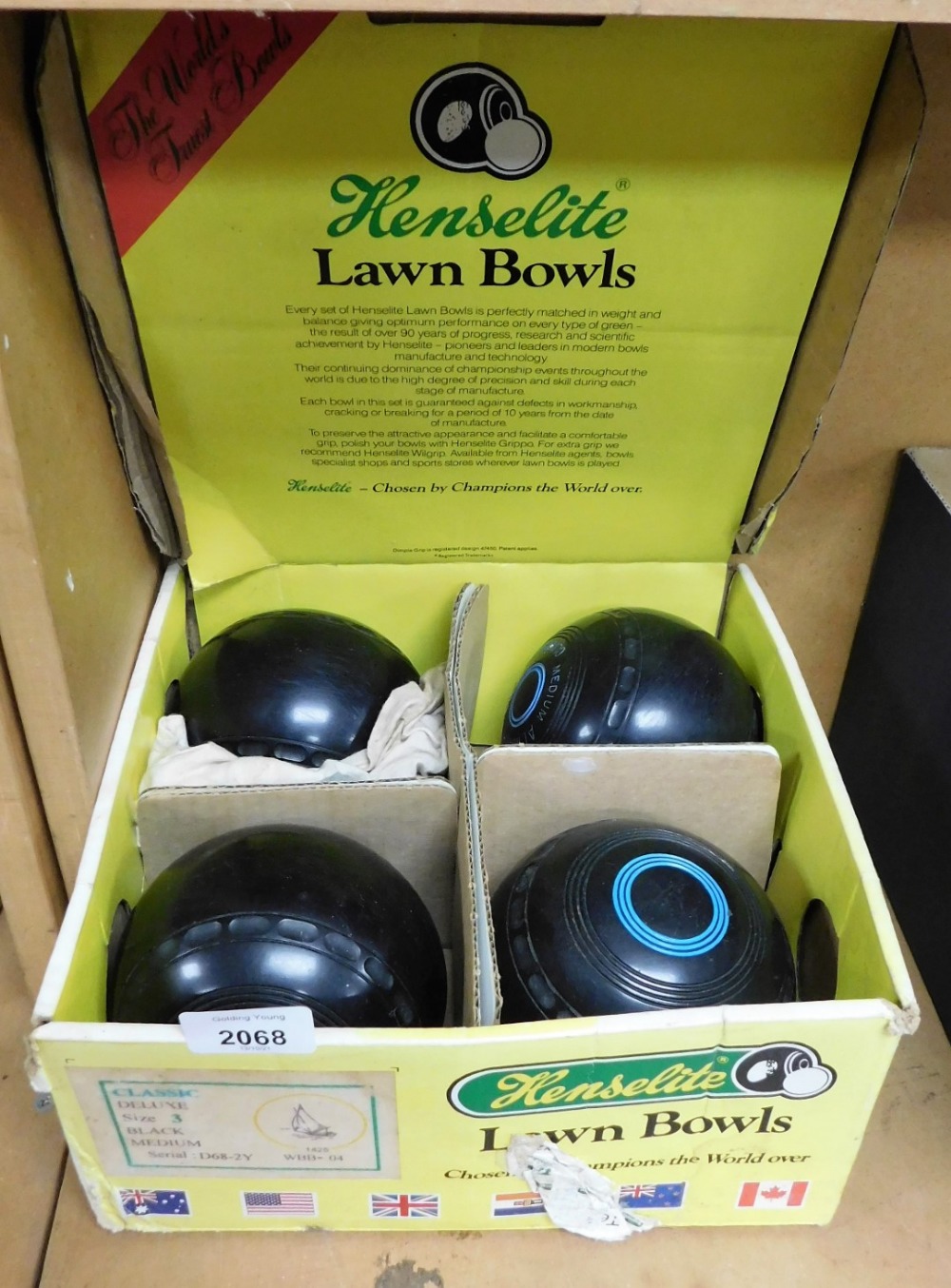 A set of Henselite lawn bowls, in cardboard case.