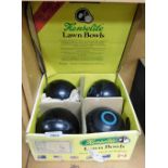 A set of Henselite lawn bowls, in cardboard case.